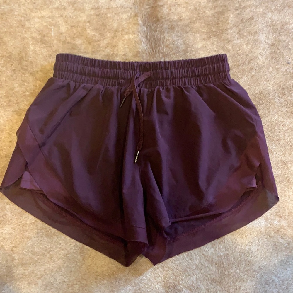 HALARA High-Rise Contrast Mesh Drawstring 2–in-1 Side-Split Shorts